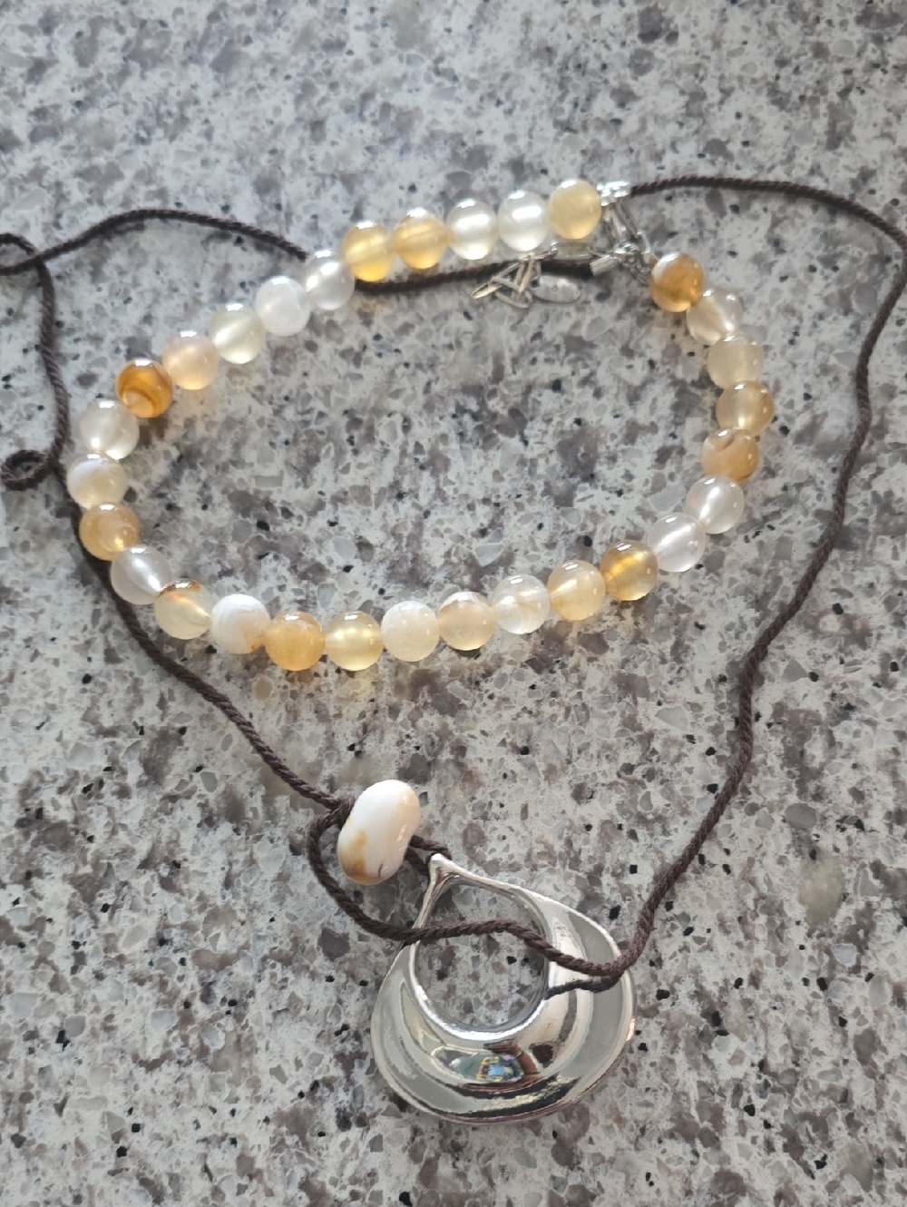 Silver Crescent Pendant Necklace with Yellow and Cream Beaded Strand